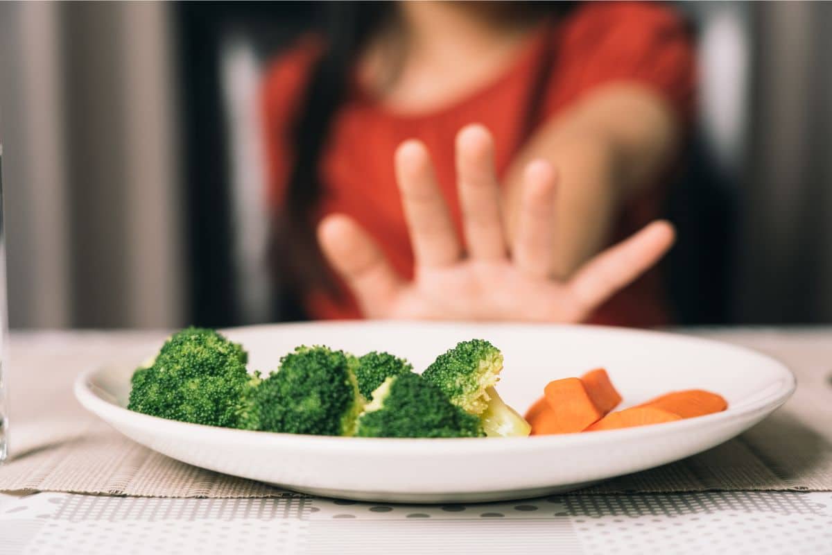 Child pushing away food